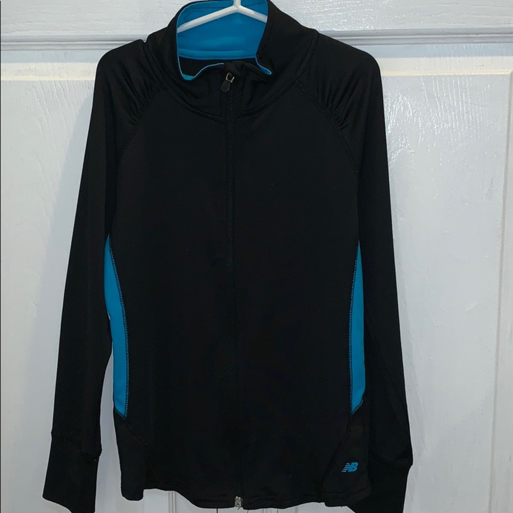 Black and blue jump suit from New Balance